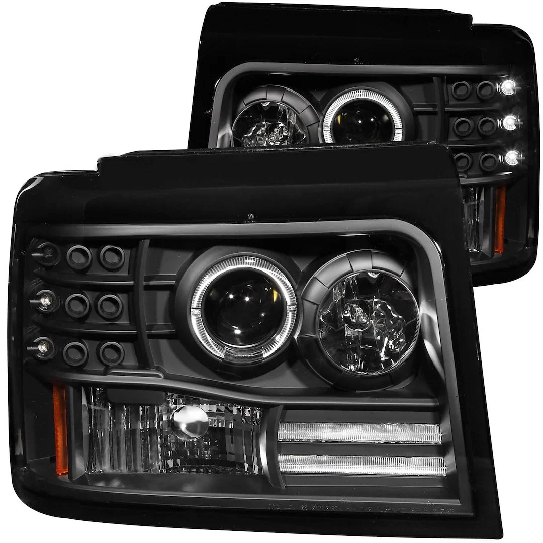 111184 – ANZO Headlight Assembly, Halogen Bulb Projector Beam With Halo Clear/ Amber Lens Black Housing Set Of 2